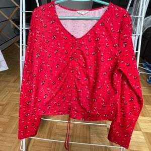 Red shirt with adjustable cover